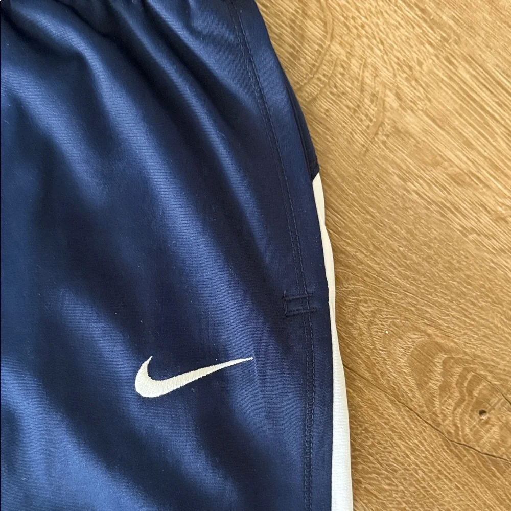 Nike Kids Navy Track Pants with White Side Stripes, Size Medium